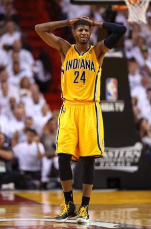 El Heat de Miami derrota espectacularmente a los Peacers de Indiana en tiempo extra 103-102 con soberbia canasta de Lebron James.