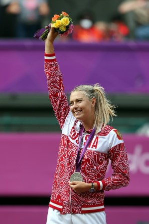 Aquí durante la premiación del tenis femenino.