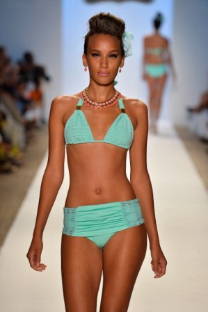 MIAMI, FL - JULY 20: A model walks the runway at the Nicolita show during Mercedes-Benz Fashion Week Swim 2014 at Oasis at the Raleigh on July 20, 2013 in Miami, Florida. (Photo by Frazer Harrison/Getty Images for Mercedes-Benz Fashion Week Swim 2014)