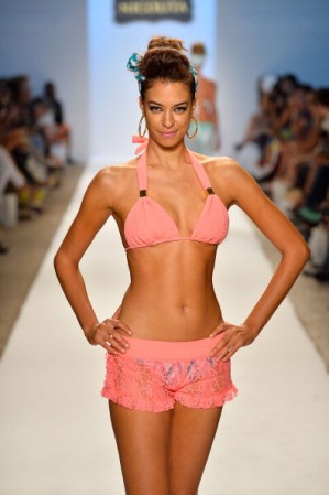 MIAMI, FL - JULY 20: A model walks the runway at the Nicolita show during Mercedes-Benz Fashion Week Swim 2014 at Oasis at the Raleigh on July 20, 2013 in Miami, Florida. (Photo by Frazer Harrison/Getty Images for Mercedes-Benz Fashion Week Swim 2014)