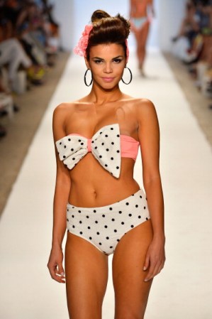 MIAMI, FL - JULY 20: A model walks the runway at the Nicolita show during Mercedes-Benz Fashion Week Swim 2014 at Oasis at the Raleigh on July 20, 2013 in Miami, Florida. (Photo by Frazer Harrison/Getty Images for Mercedes-Benz Fashion Week Swim 2014)