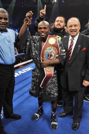 LAS VEGAS, NV - OCTOBER 12: WBO welterweight champion Timothy Bradley Jr. celebrates after defeating Juan Manuel Marquez (not pictured) during their bout at the Thomas & Mack Center on October 12, 2013 in Las Vegas, Nevada. Timothy Bradley Jr. wins in a split-decision victory over Juan Manuel Marquez. (Photo by Jeff Bottari/Getty Images)