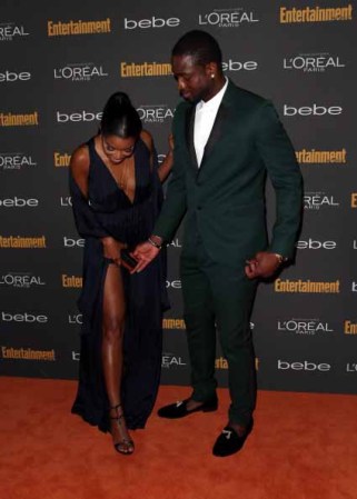 Gabrielle Union y Dwyane Wade arrive at Fiesta previa a los Emmy en Sept, 2013.