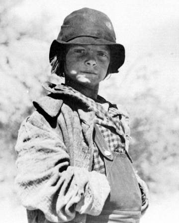 Niño trabajador inmigrante, 1930.