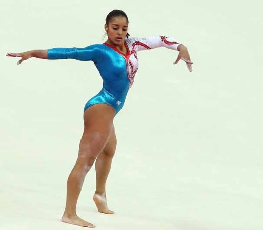 DIA 2: Lorena Quiñones Moreno, de Puerto Rico, compite en ejercicios de piso con el equipo femenil de Gimnasia Artística.