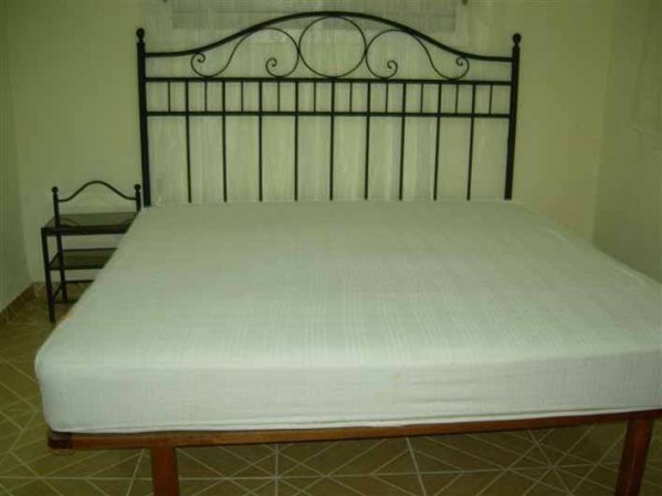 Cama King.