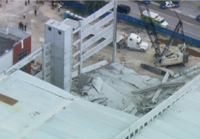 Imágenes tomadas desde el helicóptero deTelemundo 51 tras derrumbarse un garaje de varios pisos en el recinto del Miami-Dade College del Doral
