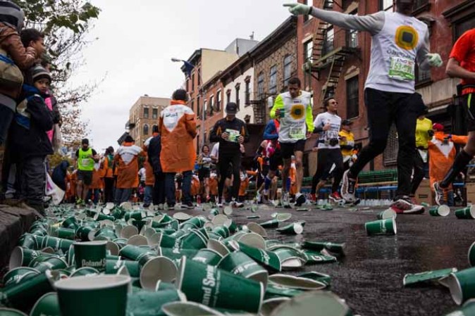 NEW YORK, NY - NOVEMBER 03: Used water cups litter the sidelines of the ING New York City Marathon on November 3, 2013 in the Williamsburg neighboord of the Brooklyn borough of New York City. With the Boston Marathon bombing from earlier this year still fresh in many minds, security is especially high this year at the New York City marathon. (Photo by Andrew Burton/Getty Images)