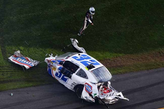 DAYTONA BEACH, FL - FEBRUARY 23: Kyle Larson, driver of the #32 Clorox Chevrolet, gets out of his car following an incident at the finish of the NASCAR Nationwide Series DRIVE4COPD 300 at Daytona International Speedway on February 23, 2013 in Daytona Beach, Florida. (Photo by Jonathan Ferrey/Getty Images)