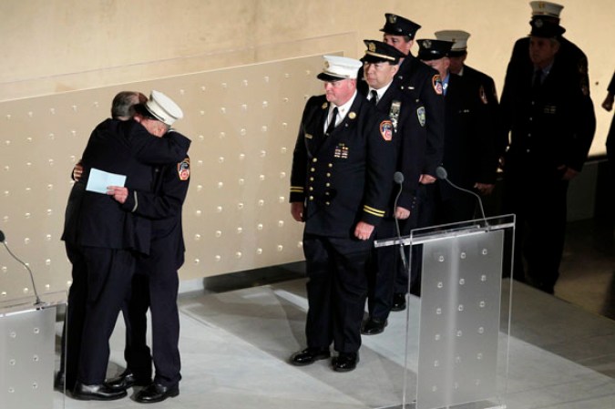 NEW YORK, NY - MAY 15: Former New York City Mayor Rudy Giuliani introduces 11 members of the FDNY and Port Authority during the opening ceremony for the National September 11 Memorial Museum at ground zero May 15, 2014 in New York City. The museum spans seven stories, mostly underground, and contains artifacts from the attack on the World Trade Center Towers on September 11, 2001 that include the 80 ft high tridents, the so-called "Ground Zero Cross," the destroyed remains of Company 21's New York Fire Department Engine as well as smaller items such as letter that fell from a hijacked plane and posters of missing loved ones projected onto the wall of the museum. The museum will open to the public on May 21. (Photo by John Angelillo-Pool/Getty Images)