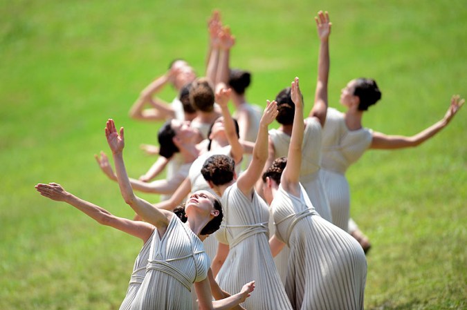 ATHENS, GREECE - MAY 10: Priestesses during the performance of 'the gable's on the hill during the Lighting Ceremony of the Olympic Flame at Ancient Olympia on May 10, 2012 in Olympia, Greece. (Photo by Jamie McDonald/Getty Images)