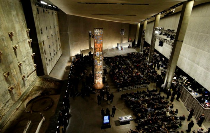 NEW YORK, NY - MAY 15: U.S. President Barack Obama speaks during the opening ceremony for the National September 11 Memorial Museum at ground zero May 15, 2014 in New York City. The museum spans seven stories, mostly underground, and contains artifacts from the attack on the World Trade Center Towers on September 11, 2001 that include the 80 ft high tridents, the so-called "Ground Zero Cross," the destroyed remains of Company 21's New York Fire Department Engine as well as smaller items such as letter that fell from a hijacked plane and posters of missing loved ones projected onto the wall of the museum. The museum will open to the public on May 21. (Photo by John Angelillo-Pool/Getty Images)