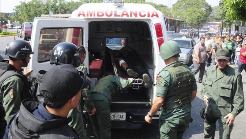 26 DE ENERO DE 2013: Un violento motín que se registró en una cárcel del centro de Venezuela dejó 58 muertos, dijeron autoridades, en el primer conteo oficial más de dos días después del amotinamiento.<br /><br /><br /> 58 presos muertos en un motín en Venezuela <br /><br /><br /><br /> 58 presos muertos tras motín <br />