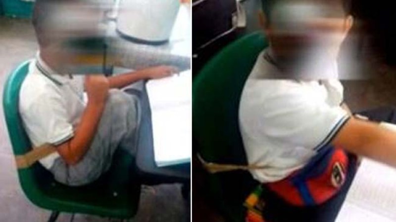 Enojo por alumnos amarrados con cinta