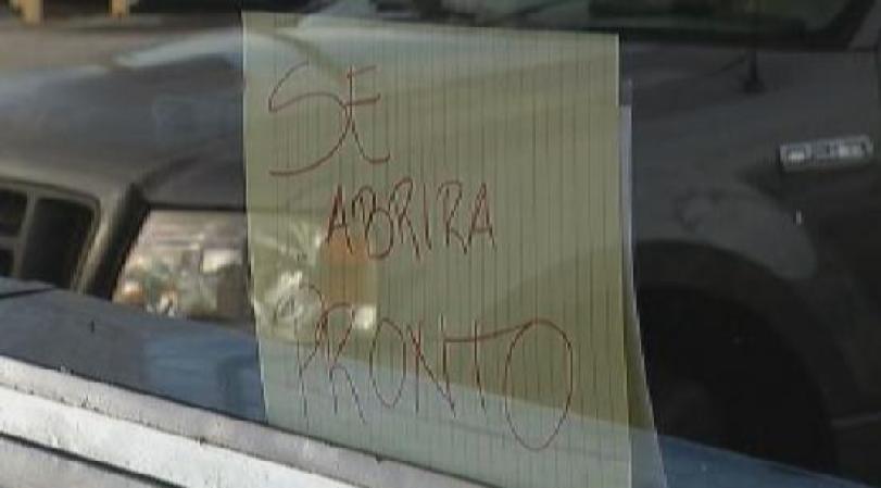 Un cartel anuncia que abrirá pronto.