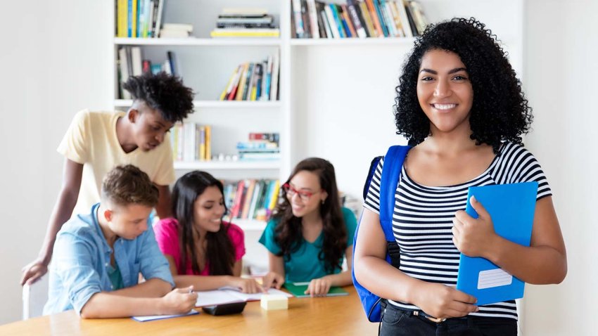 Mexican female student with group of international students