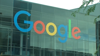 Exterior of Google headquarters with company logo.