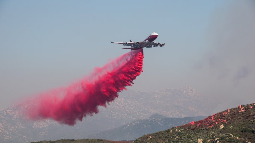 Global Supertanker 944 makes a fire retardant drop over Horsethief Canyon along Lyons Valley Road during day 2 of the Valley Fire.