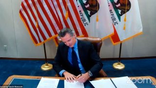 This image made from video from the Office of the Governor shows California Gov. Gavin Newsom signing into law a bill that establishes a task force to come up with recommendations on how to give reparations to Black Americans on Wednesday, Sept. 30, 2020, in Sacramento, Calif. The law establishes a nine-member task force to come up with a plan for how the state could give reparations to Black Americans, what form those reparations might take and who would be eligible to receive them.