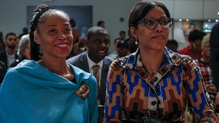 Malcolm X's daughters Ilyasah (R) and Malikah (L)