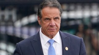 Former New York Gov. Andrew Cuomo prepares to board a helicopter after announcing his resignation, Aug. 10, 2021, in New York. The three-term Democratic governor stepped down in favor of his lieutenant governor, Kathy Hochul, as momentum built in the Legislature to remove him by impeachment.