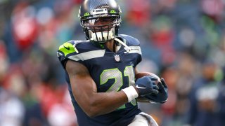 Adrian Peterson #21 of the Seattle Seahawks warms up before the game against the San Francisco 49ers at Lumen Field on December 5, 2021 in Seattle, Washington.