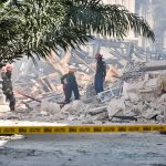 Rescuers work after an explosion in the Saratoga Hotel in Havana