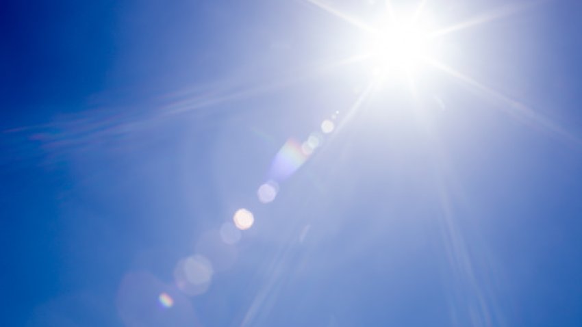 Lens flare sunlight and clear blue sky