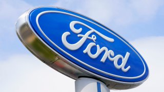 FILE - A Ford sign is shown at a dealership in Springfield, Pa., April 26, 2022.