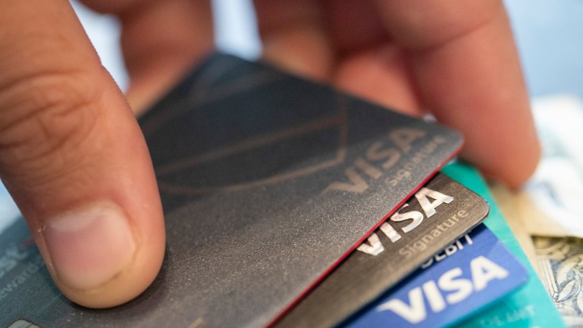 FILE – Visa credit cards are seen on Aug. 11, 2019, in New Orleans. Payment processor Visa Inc. said late Saturday, Sept. 10, 2022, that it plans to start separately categorizing sales at gun shops. (AP Photo/Jenny Kane, File)