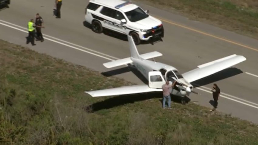 A small plane landed on a roadway in Pembroke Pines.