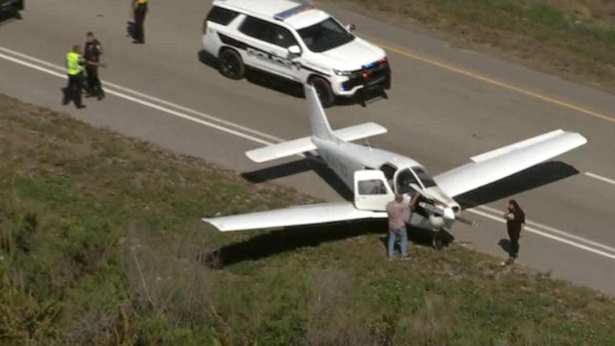A plane makes an emergency landing on the US-27 freeway in Pembroke Pines
