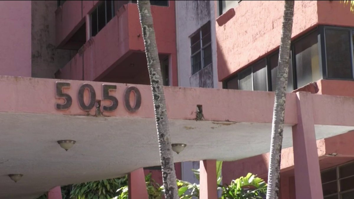 Residents of Building 5050 receive keys to return to their apartments