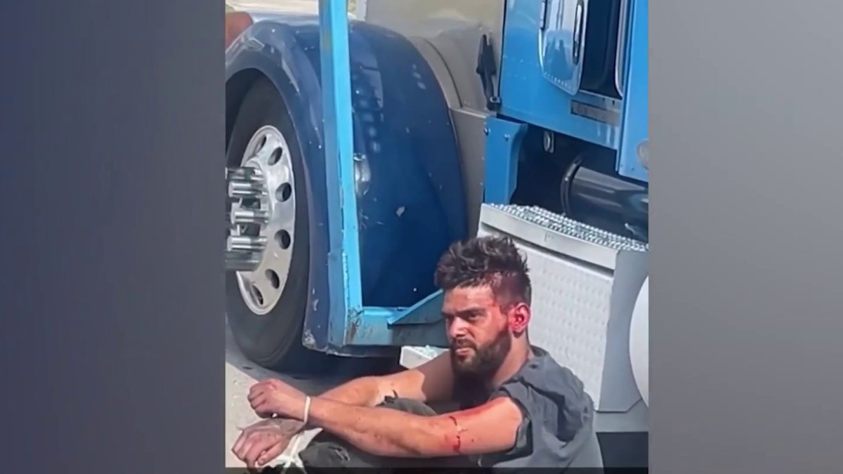 Two men assault a suspect who steals a truck