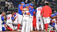 Cuba players celebrate the team's victory and the qualification for semifinals following the World Baseball Classic quarterfinal between Australia and Cuba at Tokyo Dome on March 15, 2023 in Tokyo, Japan.