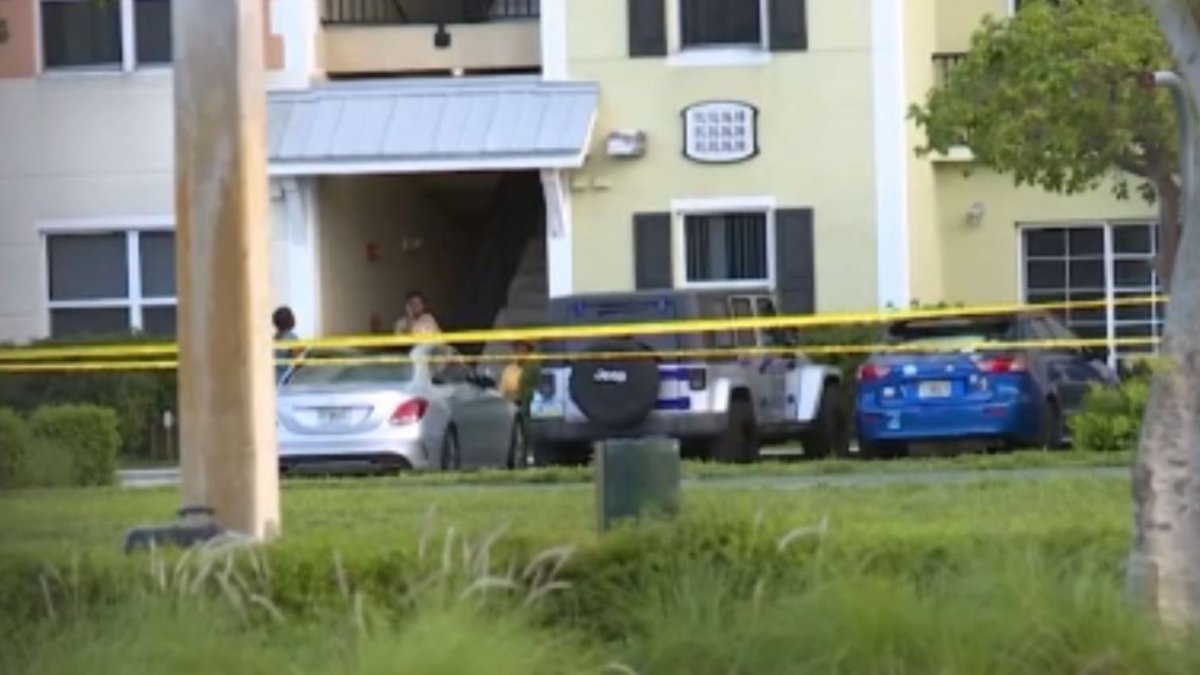 An elderly woman is shot dead while standing on the balcony of her apartment