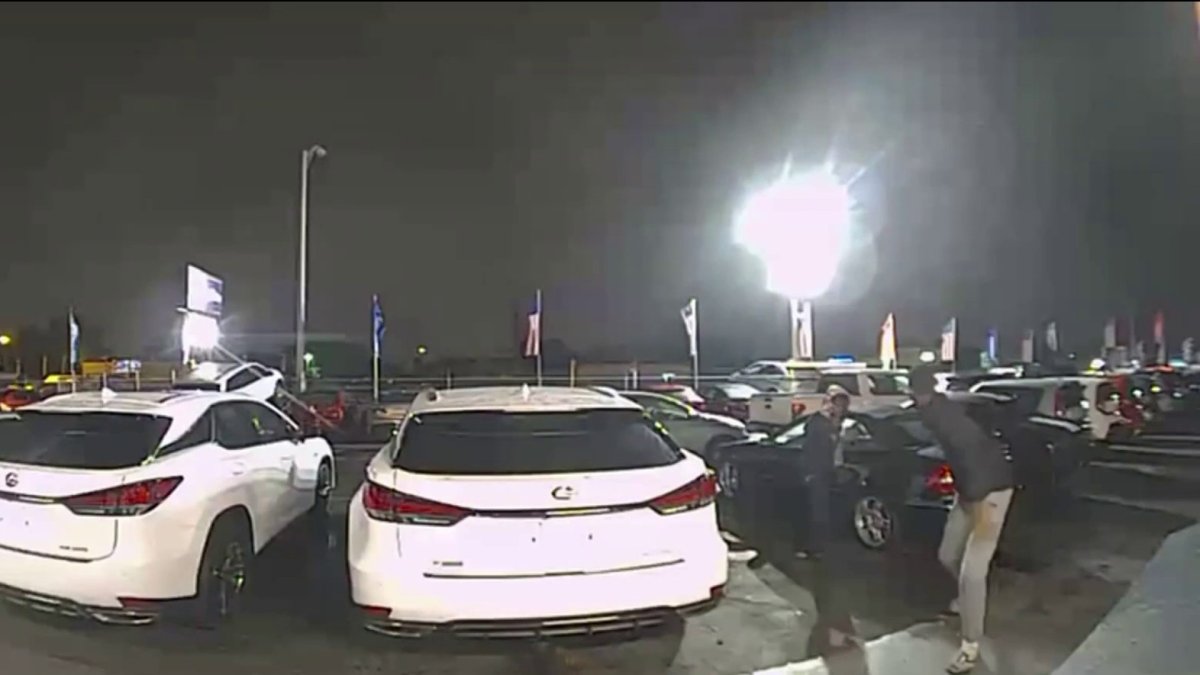 A failed robbery attempt at a car dealership is filmed