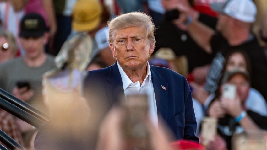 Former US President Donald Trump exits the stage after speaking at a campaign event in Waco, Texas, US, on Saturday, March 25, 2023. A defiant Trump railed against the investigations he faces and predicted hed prevail during a rally in Waco that may be the former presidents last public appearance before he faces potential criminal charges. Photographer: Sergio Flores/Bloomberg via Getty Images