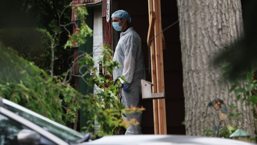 MASSAPEQUA PARK, NEW YORK – JULY 14: Law enforcement officials are seen as they investigate the home of a suspect arrested in the unsolved Gilgo Beach killings on July 14, 2023 in Massapequa Park, New York. A suspect in the Gilgo Beach killings was arrested in the unsolved case tied to at least 10 sets of human remains that were discovered since 2010 in suburban Long Island. The suspect Rex Heuermann is expected to be arraigned after his arrest Thursday night. A grand jury charged Heurmann with six counts of murder. The charges stem from the deaths of three of the four “Gilgo Four” women whose bodies were discovered along a stretch of Ocean Parkway in Long Island in 2010.  (Photo by Michael M. Santiago/Getty Images)