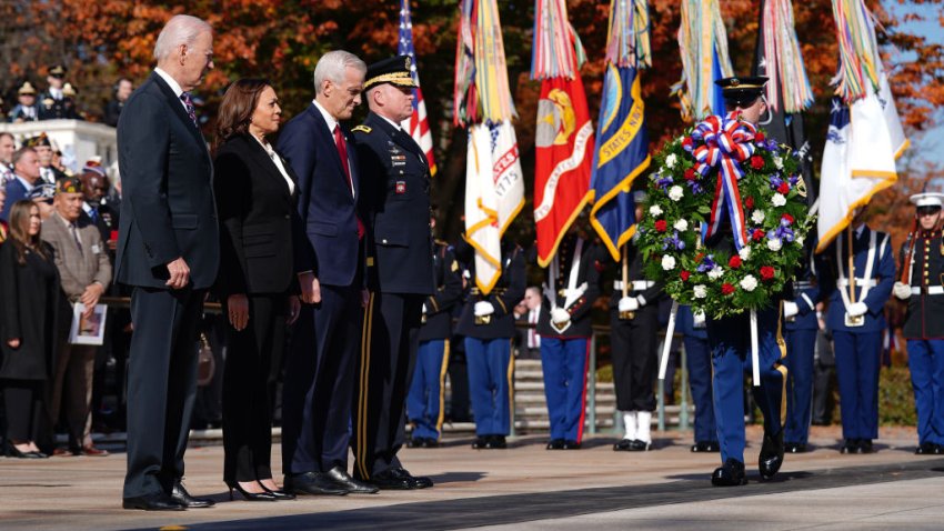 US President Joe Biden, from left, US Vice President Kamala Harris, Denis McDonough, US secretary of Veterans Affairs (VA), and Major General Allan Pepin, commanding general of the Joint Task Force, participate in a Presidential Armed Forces Full Honor Wreath-Laying Ceremony at the Tomb of the Unknown Soldier at Arlington National Cemetery in Arlington, Virginia, US, on Saturday, Nov. 11, 2023. President Biden will sit down with his Chinese counterpart, Xi Jinping, on Nov. 15, the first conversation between the two leaders in a year. Photographer: Bonnie Cash/UPI/Bloomberg via Getty Images