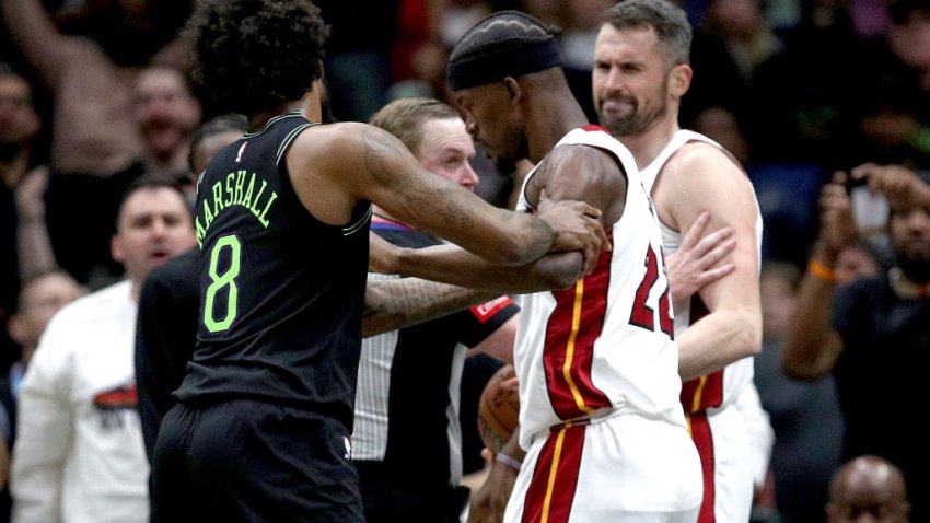 NEW ORLEANS, LOUISIANA – FEBRUARY 23: Naji Marshall #8 of the New Orleans Pelicans and Jimmy Butler #22 of the Miami Heat are involved in an altercation during the fourth quarter of an NBA game at Smoothie King Center on February 23, 2024 in New Orleans, Louisiana. Both players were ejected. NOTE TO USER: User expressly acknowledges and agrees that, by downloading and or using this photograph, User is consenting to the terms and conditions of the Getty Images License Agreement. (Photo by Sean Gardner/Getty Images)