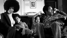 LOS ANGELES, CA - JANUARY 8:  NFL star O.J. Simspson talks on the phone while doing a portrait session at home with his wife Marguerite (Whitley) Simpson, daughter Arnelle and son Jason on January 8, 1973 in Los Angeles, California.  (Photo by Michael Ochs Archives/Getty Images)