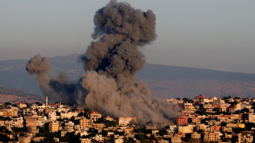 Black smoke billows following an Israeli air strike that targeted a house in the southern Lebanese village of Khiam near the Lebanese-Israeli border on June 21, 2024, amid ongoing cross-border clashes between Israeli troops and Hezbollah fighters.