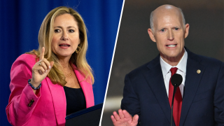 Debbie Mucarsel-Powell y Rick Scott.