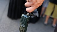 A man holds an Icom walkie talkie device after he removed the battery during the funeral of persons killed when hundreds of paging devices exploded in a deadly wave across Lebanon the previous day, in Beirut’s southern suburbs on September 18, 2024. Hundreds of pagers used by Hezbollah members exploded across Lebanon on September 17, killing at least nine people and wounding around 2,800 in blasts the Iran-backed militant group blamed on Israel. (Photo by ANWAR AMRO / AFP) (Photo by ANWAR AMRO/AFP via Getty Images)