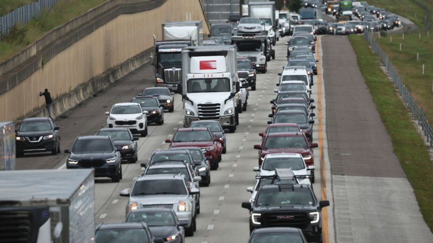 FOUR CORNERS, FLORIDA – SEPTEMBER 27: Heavy traffic moves slowly on I-4 East as residents evacuate the Gulf Coast of Florida in advance of the arrival of Hurricane Ian on September 27, 2022 in Four Corners, Florida. Ian is expected in the Tampa Bay area Wednesday night into early Thursday morning. (Photo by Win McNamee/Getty Images)