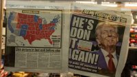 The New York Post is displayed in the window of a newsstand inside of Trump Tower in New York City, November 6, 2024. Donald Trump won a sweeping victory Wednesday in the US presidential election, defeating Kamala Harris to complete an astonishing political comeback that sent shock waves around the world. (Photo by David Dee Delgado / AFP) (Photo by DAVID DEE DELGADO/AFP via Getty Images)