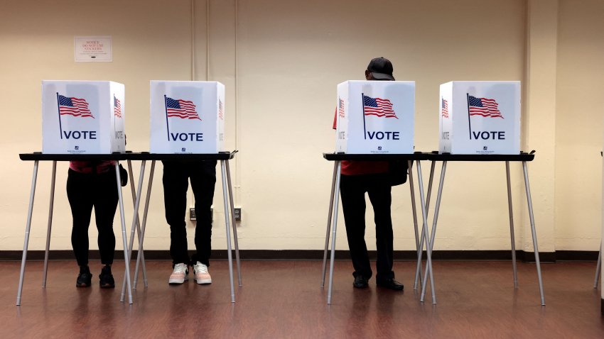 People cast their in-person early ballot for the 2024 general election at the Northwest Activities Center on October 29, 2024 in Detroit, Michigan. (Photo by JEFF KOWALSKY / AFP) (Photo by JEFF KOWALSKY/AFP via Getty Images)