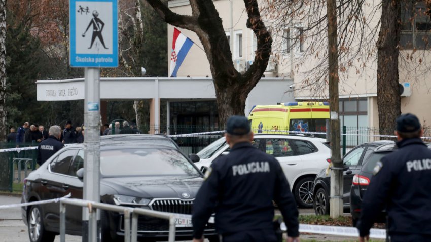 ZAGREB, CROATIA – DECEMBER 20: Croatian police officers conduct investigation at the site after a knife attack at the Precko Primary School in Zagreb, Croatia on December 20, 2024. It is reported that 1 student died, 1 teacher and 5 students were injured. In a statement made by Zagreb Police, identity of the attacker has not yet been determined. (Photo by Stipe Majic/Anadolu via Getty Images)