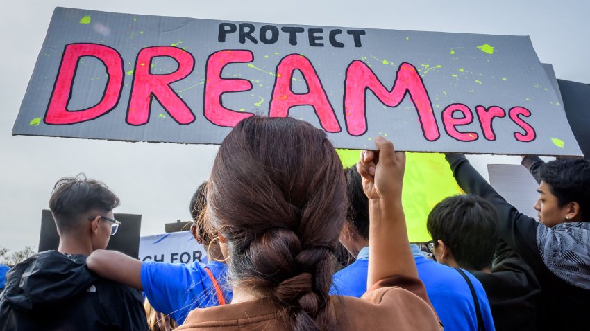 MANHATTAN, NEW YORK, UNITED STATES – 2019/10/26: Participant holding a protest sign at the rally. Immigration advocates and allies gathered at Battery Park to launch an 18-day march to Washington, D.C. as Deferred Action for Childhood Arrivals (DACA) recipients, Temporary Protected Status (TPS) holders, and allies begun a 230 miles walk to continue building national support and awareness. The walk is scheduled to arrive the day the U.S. Supreme Court is set to hear oral arguments on Trumps unlawful termination of the DACA policy. (Photo by Erik McGregor/LightRocket via Getty Images)